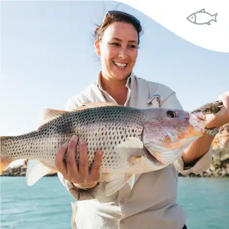 lady holding a fish