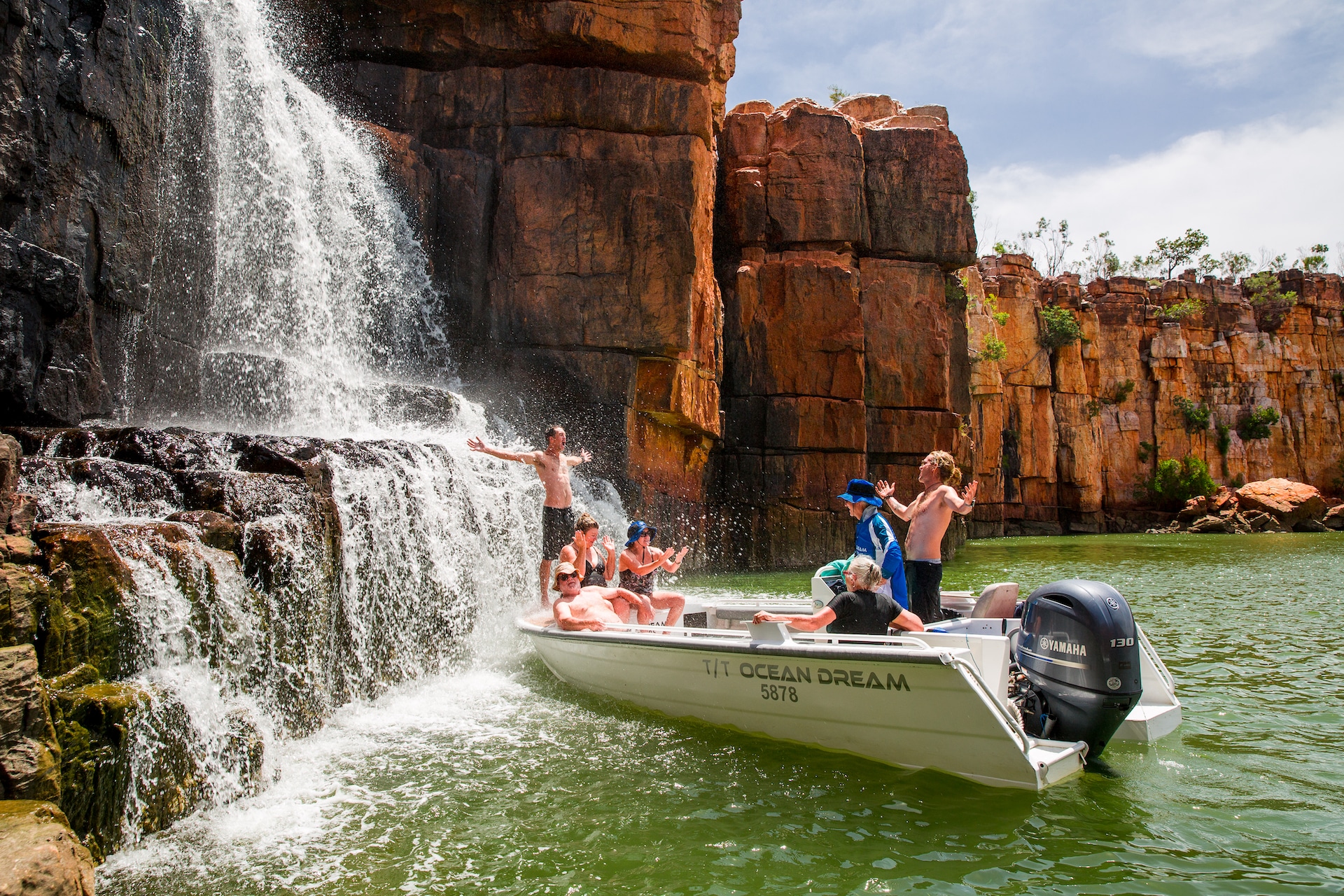 Small boat and waterfall in the Kimberley