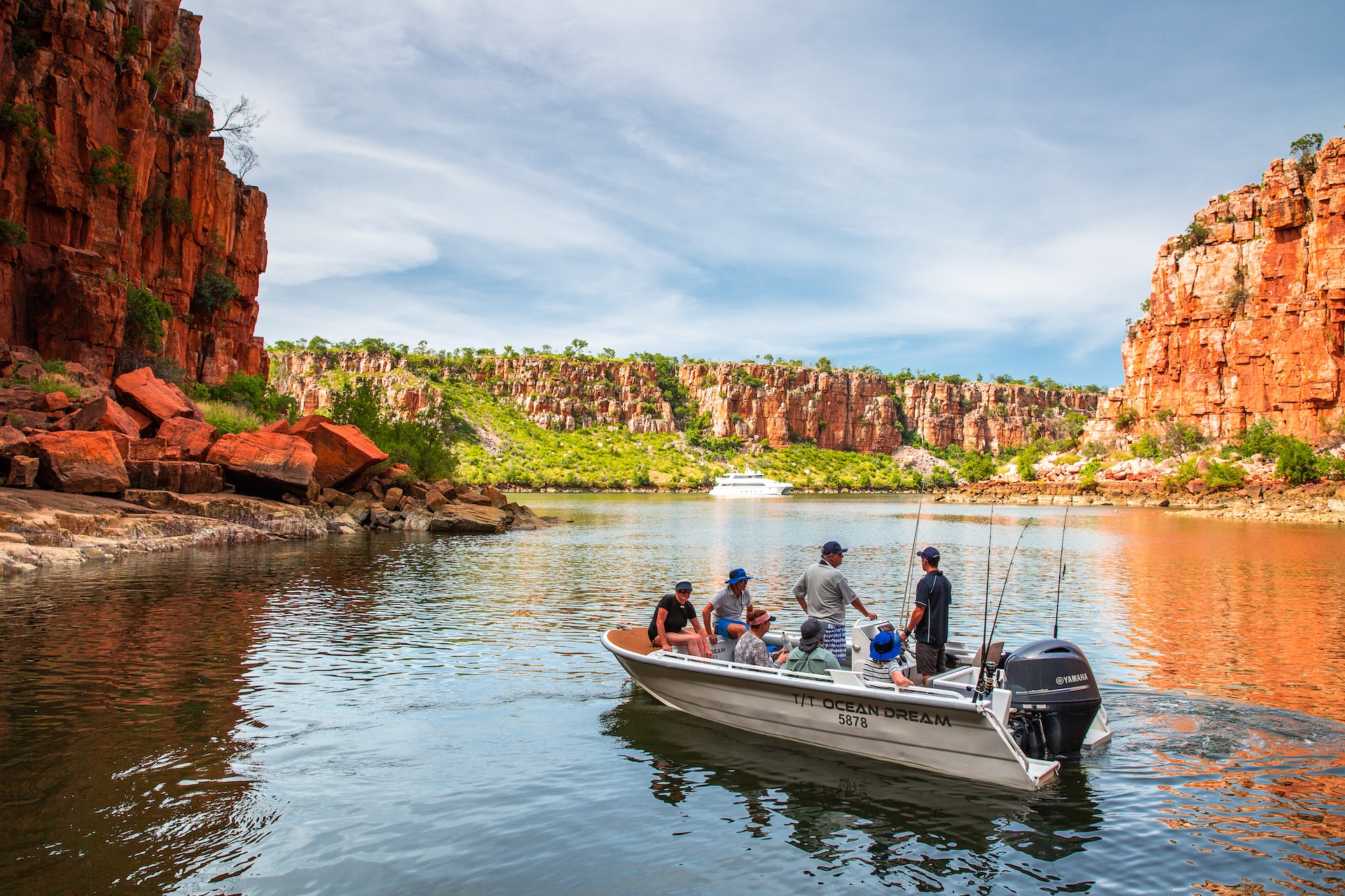Small group of tourists on a boat in the Kimberley